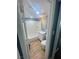 Bright bathroom featuring a tub/shower combo, white vanity, and wood-look flooring at 501 S Maryland Pkwy # C17, Las Vegas, NV 89101
