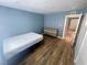 Serene bedroom featuring wood floors and a modern dresser, perfect for relaxation at 501 S Maryland Pkwy # C17, Las Vegas, NV 89101