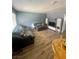 Comfortable living room with wood floors and stylish furnishings, perfect for relaxing and entertaining at 501 S Maryland Pkwy # C17, Las Vegas, NV 89101
