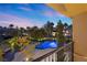Enjoy a relaxing outdoor space with lush greenery, a cozy gazebo, and a sparkling pool, perfect for entertaining guests at 5079 Mountain Top Cir, Las Vegas, NV 89148