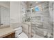 Modern bathroom featuring a glass shower with marble tile and dual flush toilet at 5079 Mountain Top Cir, Las Vegas, NV 89148
