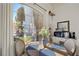 Charming dining area next to a large window offering tons of natural light at 5079 Mountain Top Cir, Las Vegas, NV 89148