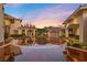 Elegant home showcasing circular driveway with lush landscaping, and impeccable architecture at 5079 Mountain Top Cir, Las Vegas, NV 89148