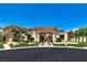 Stately home featuring a grand entrance with manicured landscaping and a circular driveway at 5079 Mountain Top Cir, Las Vegas, NV 89148