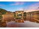 Spacious three-car garage with a circular driveway and meticulously maintained landscaping at 5079 Mountain Top Cir, Las Vegas, NV 89148