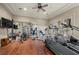 Home gym complete with treadmill, weight machines, TV, and mirrored wall at 5079 Mountain Top Cir, Las Vegas, NV 89148