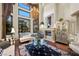 Bright living room boasting high ceilings, a fireplace, and sophisticated decor at 5079 Mountain Top Cir, Las Vegas, NV 89148