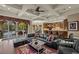 The living room opens to the gourmet kitchen and out to the backyard at 5079 Mountain Top Cir, Las Vegas, NV 89148