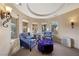 Cozy sitting area with blue chairs and decorative accents at 5079 Mountain Top Cir, Las Vegas, NV 89148