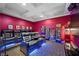 Theater room boasts tiered seating, movie decor, and a popcorn machine at 5079 Mountain Top Cir, Las Vegas, NV 89148