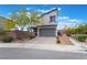 Charming two-story home with drought resistant landscaping and a two car garage at 5981 Smith Valley Rd, Las Vegas, NV 89148