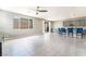 Open-concept floorplan with lots of natural light connecting the Kitchen and Living spaces at 5981 Smith Valley Rd, Las Vegas, NV 89148