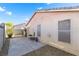 This backyard features a concrete patio, rock landscaping and seating space, perfect for relaxing outdoors at 6622 Black Oil Dr, Las Vegas, NV 89122
