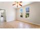 Bedroom with ceiling fan and views from multiple windows for natural light at 6622 Black Oil Dr, Las Vegas, NV 89122