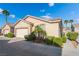 Single-story home with desert landscaping and two car garage at 6622 Black Oil Dr, Las Vegas, NV 89122