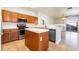 Open-concept kitchen equipped with modern appliances and a center island perfect for entertaining at 6622 Black Oil Dr, Las Vegas, NV 89122