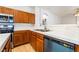 Functional kitchen with white countertops, stainless steel appliances, and ample cabinet space at 6622 Black Oil Dr, Las Vegas, NV 89122