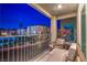 Cozy balcony with seating and potted plants, offering neighborhood views at 6821 Prairie Pearl St, Las Vegas, NV 89148