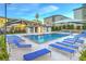 Community pool with ample lounge seating and shade canopies at 6821 Prairie Pearl St, Las Vegas, NV 89148