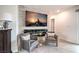 Inviting living room showcases a decorative fireplace, comfortable seating, and a tranquil, stylish design at 6821 Prairie Pearl St, Las Vegas, NV 89148