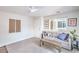 Bright and airy living room with modern decor and ample natural light at 6821 Prairie Pearl St, Las Vegas, NV 89148