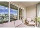 A cozy outdoor patio with comfortable seating and a view of the neighborhood at 6821 Prairie Pearl St, Las Vegas, NV 89148