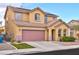 Charming two-story home with a spacious two-car garage, desert landscaping, and solar panels at 7129 Dillseed Dr, Las Vegas, NV 89131