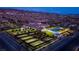 Aerial view of community pool and tennis courts, with city and mountain views at 720 Webber Park St, Henderson, NV 89011