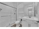 Well-lit bathroom featuring a glass-enclosed shower, modern fixtures, and a sleek vanity at 720 Webber Park St, Henderson, NV 89011