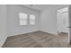 Cozy bedroom with soft carpet, bright windows, and neutral décor at 720 Webber Park St, Henderson, NV 89011