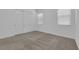 Cozy bedroom with a large closet, plush carpeting, and natural light, perfect for relaxation at 720 Webber Park St, Henderson, NV 89011