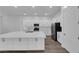 Modern kitchen with a large island and stainless steel appliances at 720 Webber Park St, Henderson, NV 89011