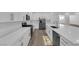 Bright modern kitchen with white countertops and stainless steel appliances at 720 Webber Park St, Henderson, NV 89011