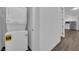Convenient laundry room with a stackable washer and dryer, maximizing space efficiency at 720 Webber Park St, Henderson, NV 89011