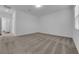 Large living area with soft carpet and a doorway to other rooms at 720 Webber Park St, Henderson, NV 89011