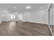 Spacious living room with wood floors and ample natural light at 720 Webber Park St, Henderson, NV 89011