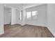 Modern living room featuring an open space and wood-look flooring at 720 Webber Park St, Henderson, NV 89011