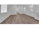 Bright living room featuring hardwood floors, neutral walls, and natural light from the window at 720 Webber Park St, Henderson, NV 89011