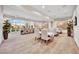 Bright meeting room featuring long tables, multiple chairs, and large windows for natural light at 720 Webber Park St, Henderson, NV 89011