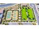 Aerial view of community tennis courts and grassy common area at 720 Webber Park St, Henderson, NV 89011