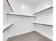 Walk-in closet with ample shelving and soft carpet at 720 Webber Park St, Henderson, NV 89011