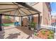 Backyard featuring a patio cover, stamped concrete, and landscaped planters at 7641 Lani Dawn St, Las Vegas, NV 89149