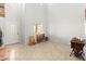 Bright entryway with tile floors, white walls, and a decorative front door with glass detailing at 7641 Lani Dawn St, Las Vegas, NV 89149