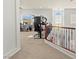 Open loft area with multiple desks, perfect for a home office or study space at 7641 Lani Dawn St, Las Vegas, NV 89149