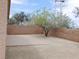 Open backyard area with desert landscaping and a concrete patio at 7924 Pale Rider St, Las Vegas, NV 89131