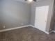 Bedroom features neutral colored walls, carpet, closet, and ceiling fan at 7924 Pale Rider St, Las Vegas, NV 89131