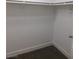 Walk-in closet featuring white walls, neutral-colored carpet, and rod for hanging clothes at 7924 Pale Rider St, Las Vegas, NV 89131