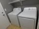 Laundry area with a white washer and dryer set at 7924 Pale Rider St, Las Vegas, NV 89131