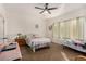 Cozy bedroom with comfortable furnishings, carpet, and natural light at 7927 Crested Starling Ct, North Las Vegas, NV 89084
