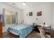 Comfortable bedroom with a fan, window, and blinds providing a relaxing atmosphere at 7927 Crested Starling Ct, North Las Vegas, NV 89084